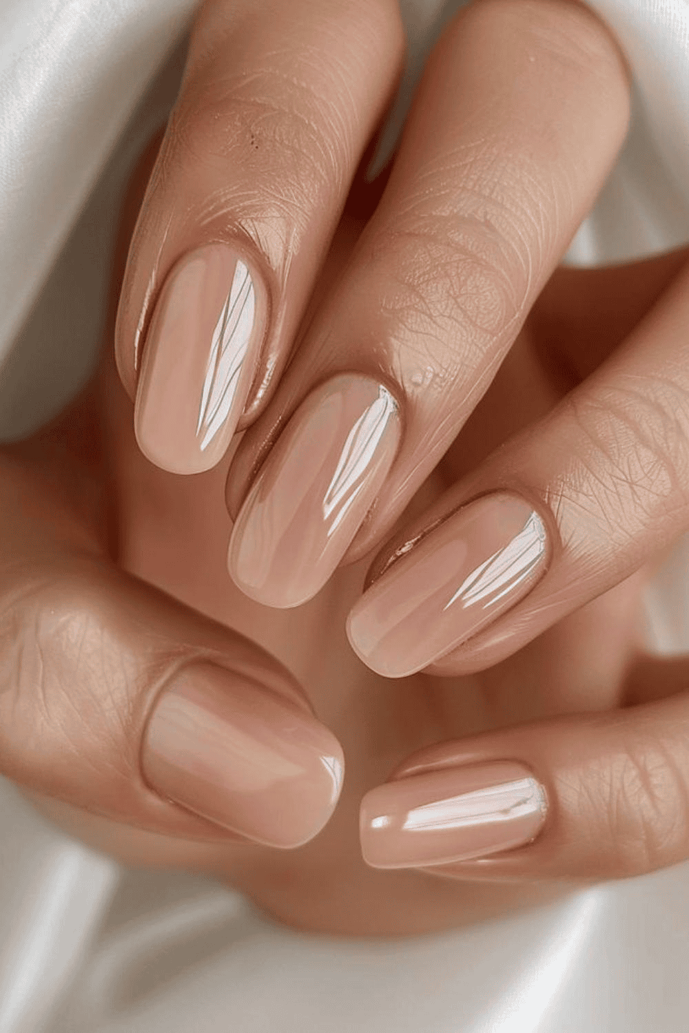 Elegant nude manicure with glossy finish at My Onenail SPA.